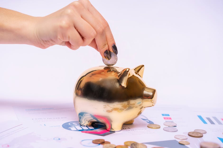 Golden piggy bank receiving coins for monthly DPS deposit