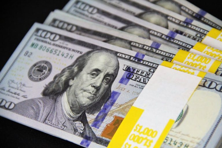 Stack of cash representing sanchayapatra savings investment